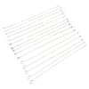 A collection of thin stainless steel ball pins arranged in parallel lines.