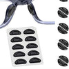 Un juego de almohadillas nasales de silicona transparentes antideslizantes para gafas, en varios tamaños y formas.