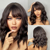 A woman models a short wavy bob wig in dark brown hair, shown from the front and side views.