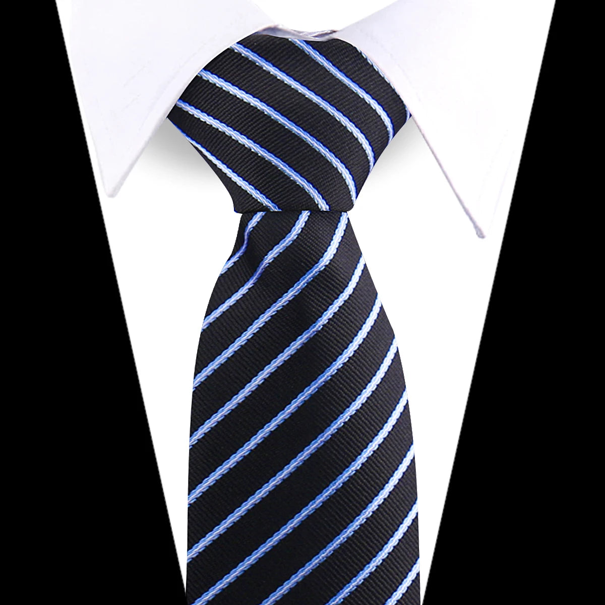 Black and blue striped silk necktie worn with a white dress shirt.