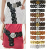 A close-up of vintage PU disc belts with metal buckles in black, silver, and gold tones.