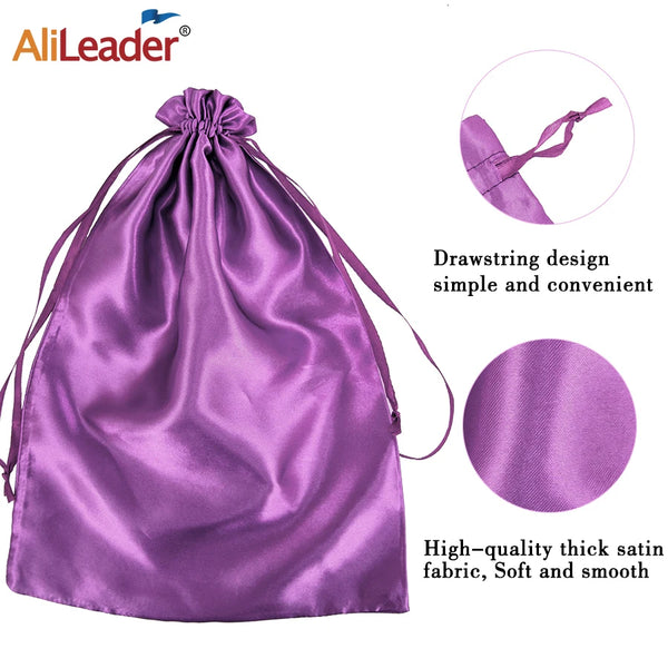 Purple satin wig storage bag with a drawstring design and a pink fabric swatch.