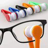 A portable multifunctional eyeglass cleaning kit showing various colored cleaning brushes and an orange brush on a pair of gl