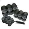 A collection of black heatless hair curlers or rollers in various sizes, including a comb-like tool.
