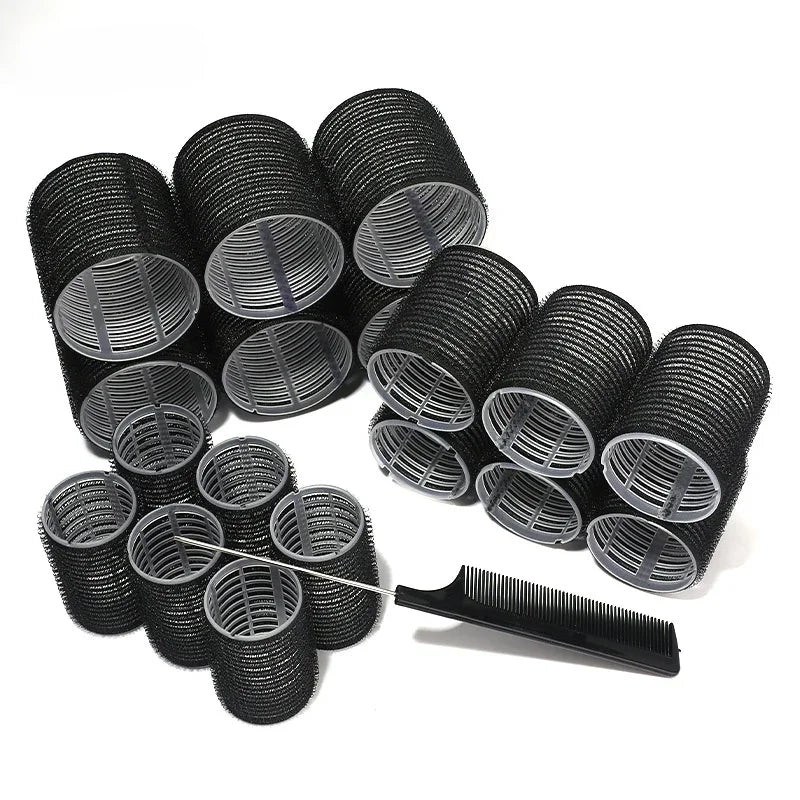A collection of black heatless hair curlers or rollers in various sizes, including a comb-like tool.
