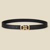 Black leather belt with a gold-toned rectangular buckle
