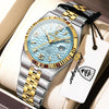 A silver and gold luxury quartz wristwatch with a light blue dial and black strap is displayed in a box.