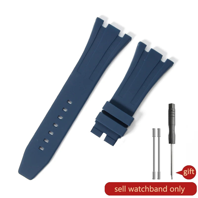 A dark blue silicone watch band with a textured strap is shown alongside a replacement strap and a gift tag.
