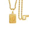 A gold-plated letter pendant necklace featuring a large, textured D charm on a gold chain.