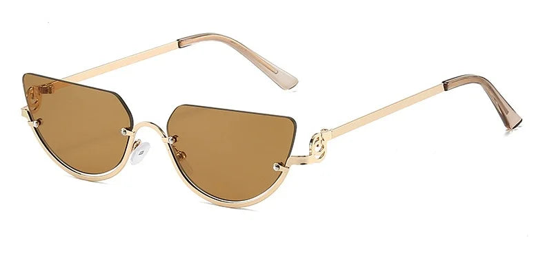Gafas de estilo ojo de gato retro de metal con monturas doradas y lentes ámbar