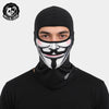 A man wearing a black full face balaclava helmet liner with a stylized mustache design.