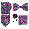 A set of men's formal tie and accessory featuring a paisley pattern in shades of blue, pink, and red.