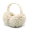 A close-up of foldable plush faux fur earmuffs in a light beige color.