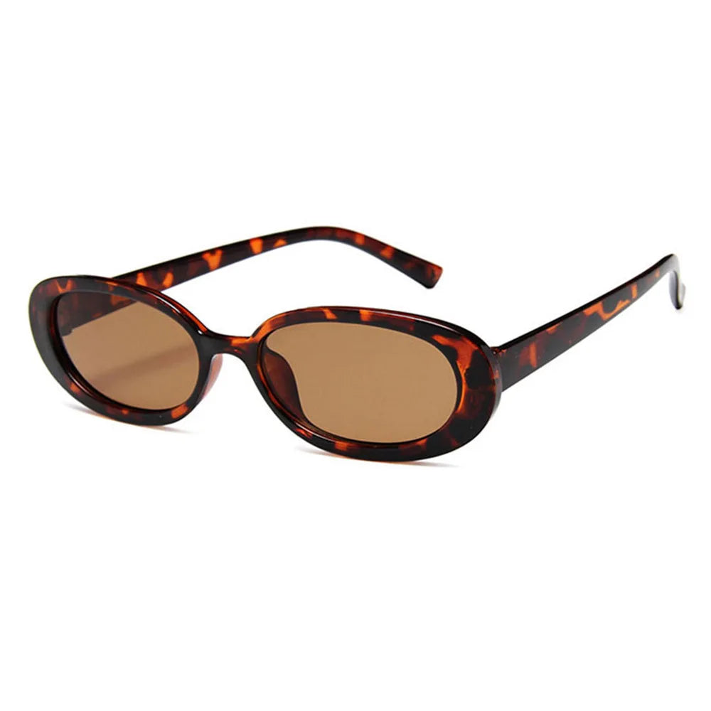 Brown tortoiseshell cat eye sunglasses with dark brown lenses and thin metal frames