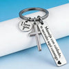 Silver stainless steel couple keychain featuring a 'I love you' charm and a cross pendant