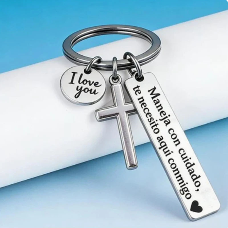 Silver stainless steel couple keychain featuring a 'I love you' charm and a cross pendant