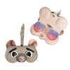 A light pink pouch with a cat-like face design holds a pair of sunglasses and a small storage item.