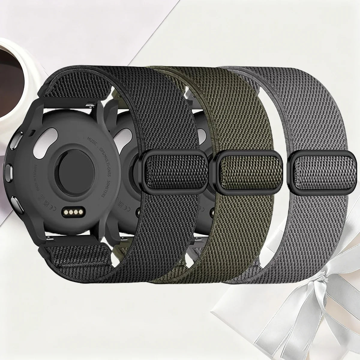 Black stretchy nylon watch bands for Garmin devices shown on a white background.