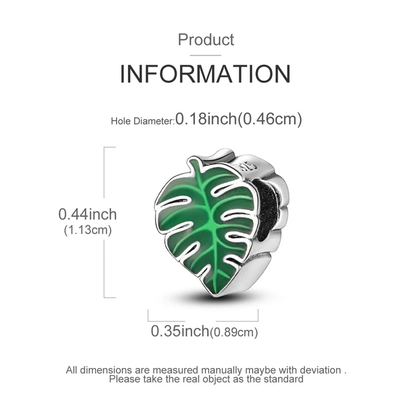 A sterling silver leaf-shaped moon charm is shown with dimensions of 0.44 inches by 0.35 inches.