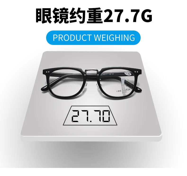 A pair of black reading glasses placed on a white weighing scale, showing the weight measurement 27.7G.