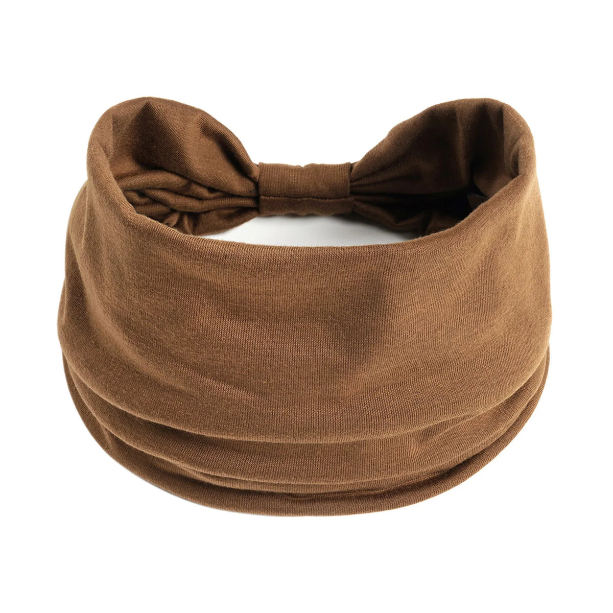 A brown boho knot headwrap hair band for women shown flat lay.