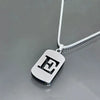 Silver stainless steel pendant necklace with an engraved capital letter E hanging from a chain