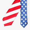 A silk necktie featuring red and white stripes and a blue field with white stars.