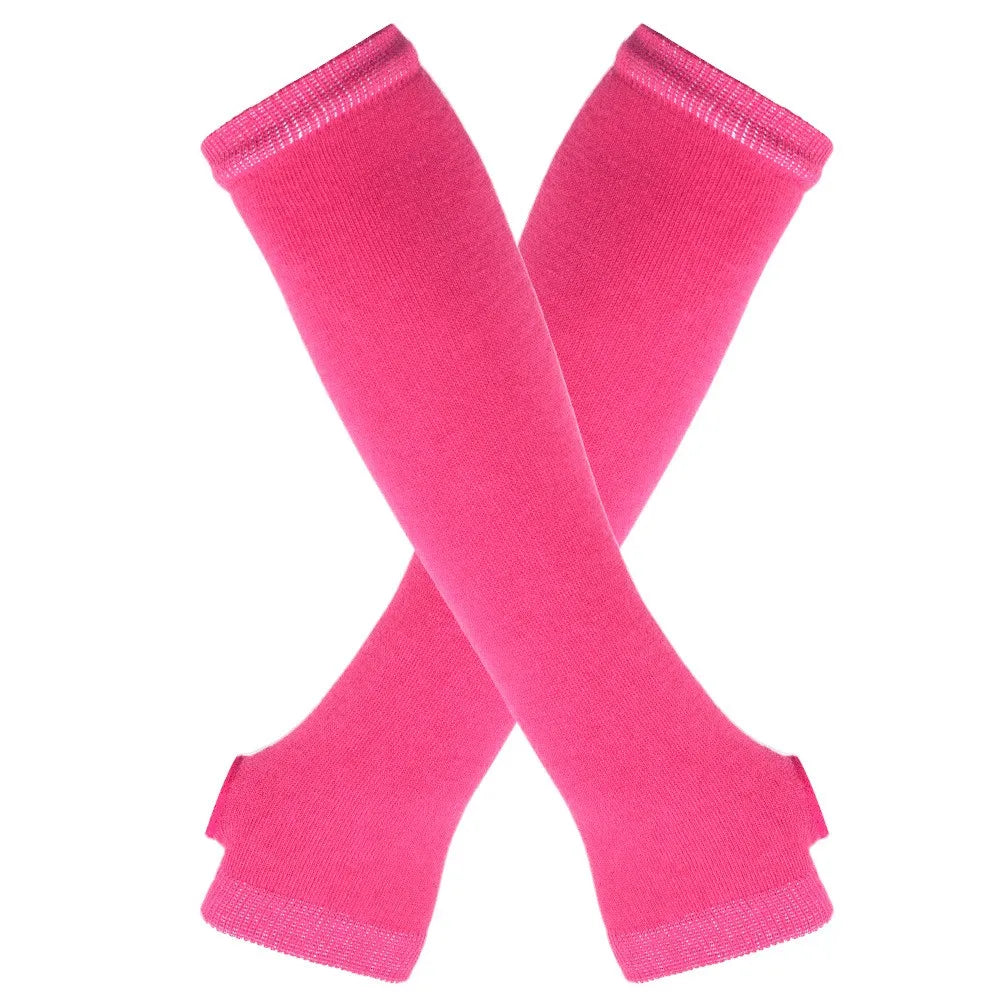 Pair of bright pink knitted fingerless gloves shown crossed