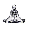A set of enamel pins featuring a skeleton character design, including a skull and full skeletal structure.