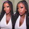 A close-up photo of a woman modeling a full lace box braid wig for black hair