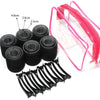 A set of black heatless hair curlers with pink silicone tips and a clear plastic bag.
