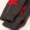 A pair of gray knitted half finger gloves featuring a red maple leaf pattern.