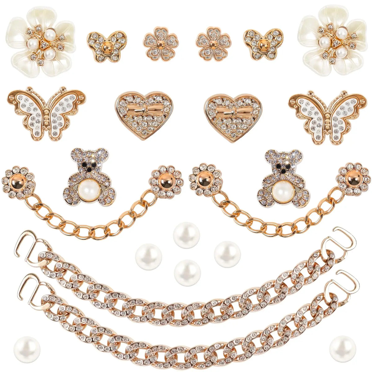 Un juego de 20 adornos para zapatos de strass brillantes con formas florales y de corazón en tono dorado.