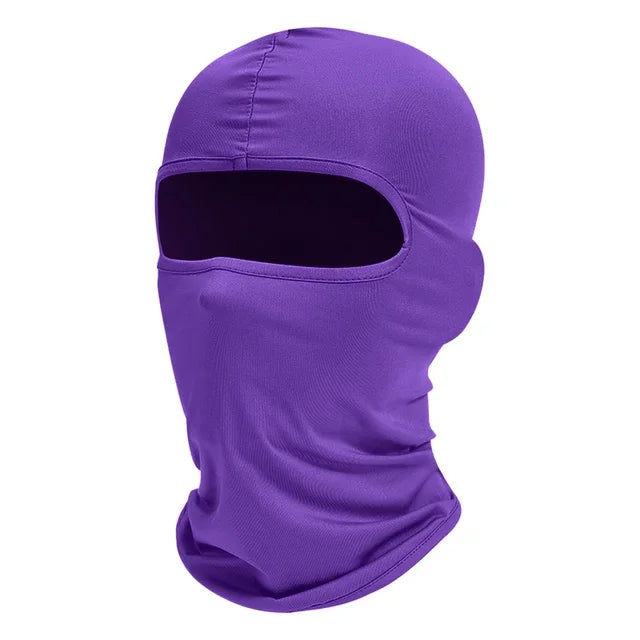 A purple tactical full face balaclava worn by a person.