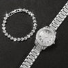A silver rhinestone heart watch set featuring a delicate bracelet and a wristwatch.