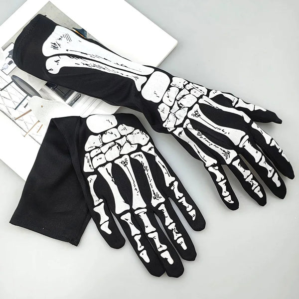 A pair of black gloves with white skeleton hand designs displayed on a white background.