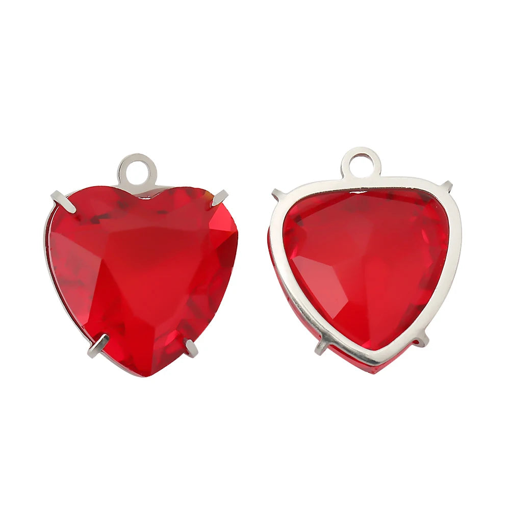A pair of red heart crystal pendants made of PVD stainless steel.