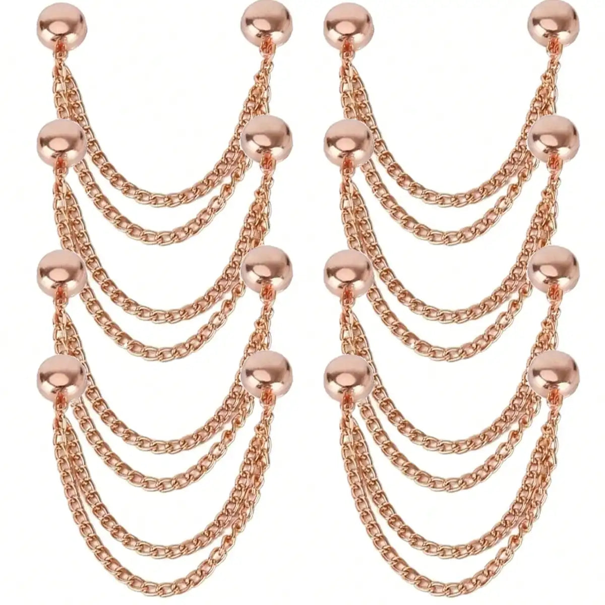 A pair of rose gold multi-function magnetic clothing clips displayed against a white background.
