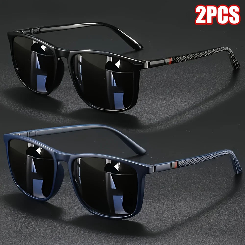 A pair of vintage square polarized cycling sunglasses in dark blue with black frames shown against a dark background.