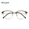 Black and gold metal eyeglasses with thin frames