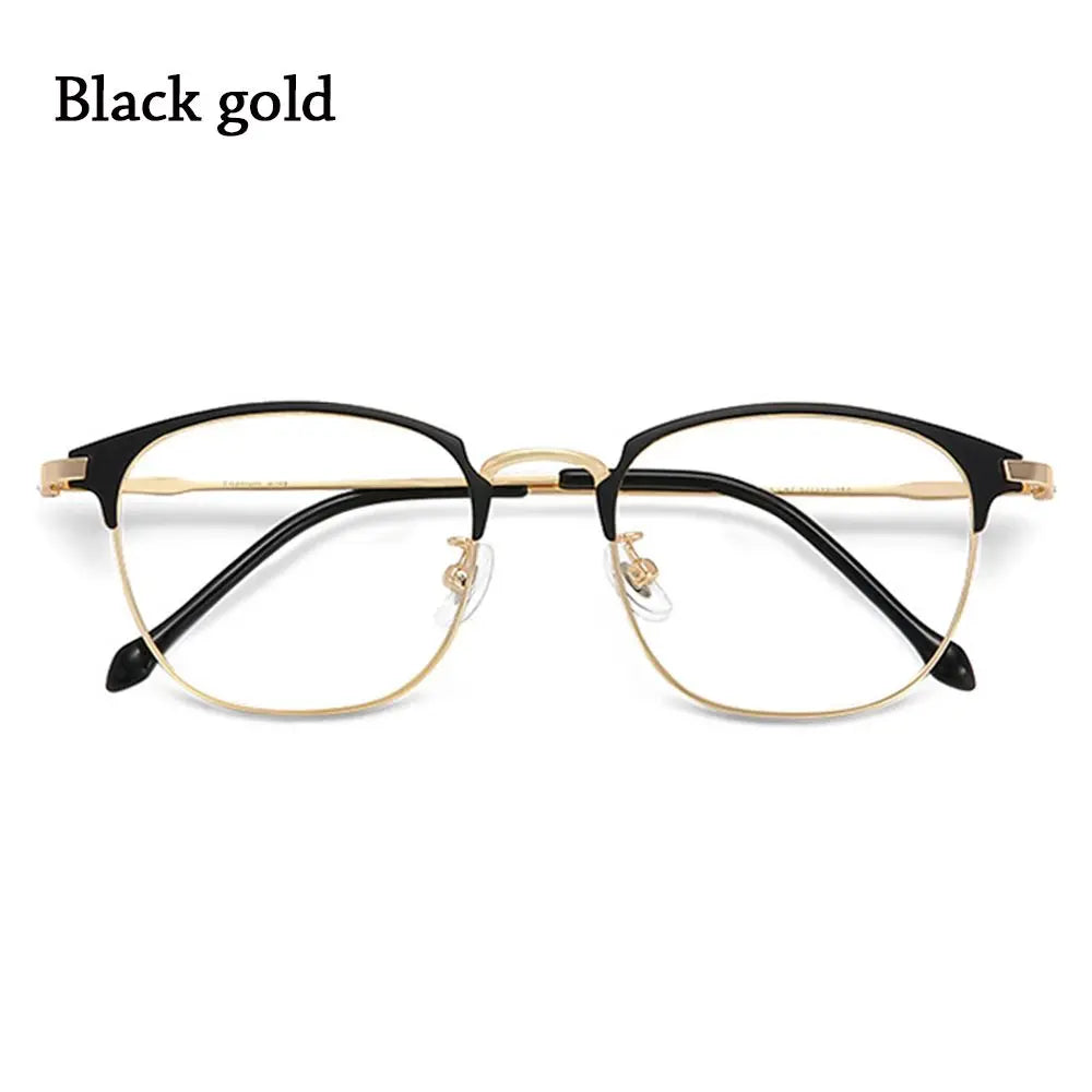 Black and gold metal eyeglasses with thin frames