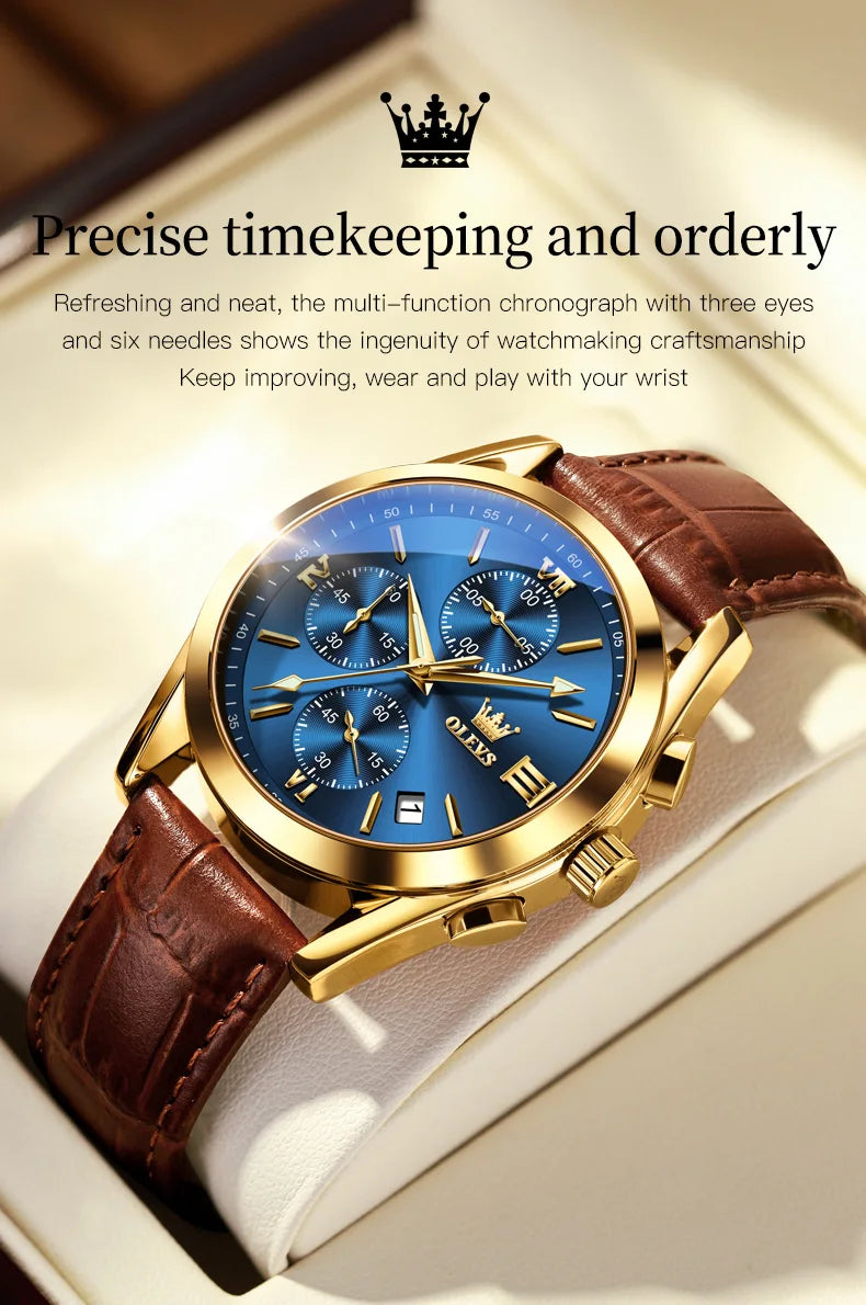 A close-up of a blue and gold multi-function chronograph wristwatch with a brown leather strap resting on a white surface.