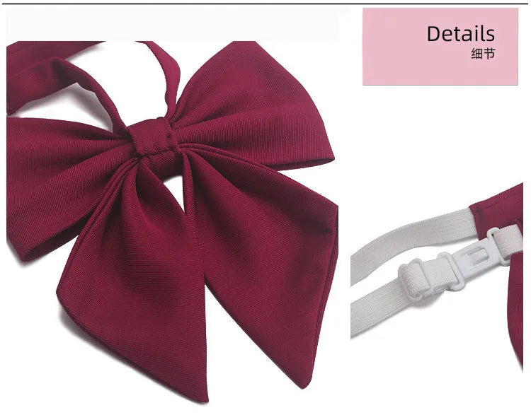 A deep burgundy butterfly ribbon tie set featuring a bow and a strap for students.