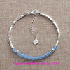 Sterling silver double heart charm bracelet with blue aquamarine beads