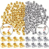 A collection of gold and silver jewelry findings stoppers spacers for connectors, including various sizes and shapes.