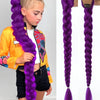 A close-up of a girl wearing a long purple synthetic braided ponytail hairstyle.