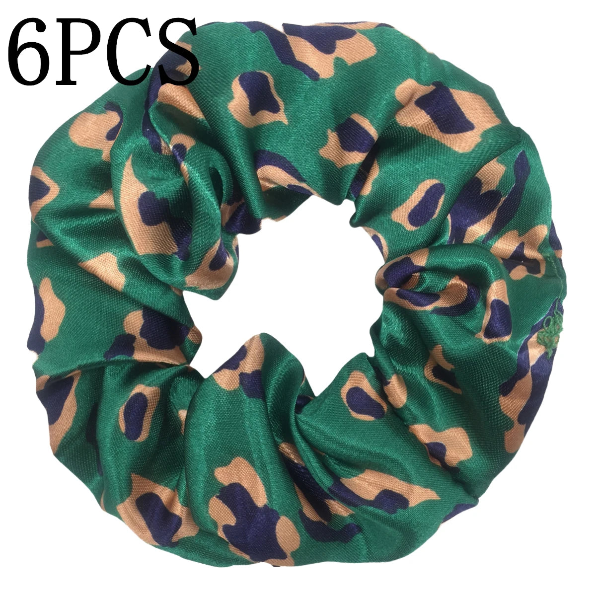 Un set de seis gomas de tela satinada con estampado floral en tonos verde, marrón y azul marino.