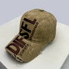 A tan baseball cap embroidered with the letters DFSL and the word shlonbrand