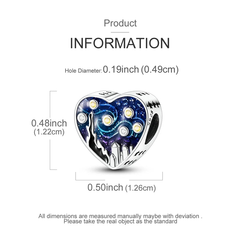A sterling silver heart-shaped charm featuring a moon and stars design.