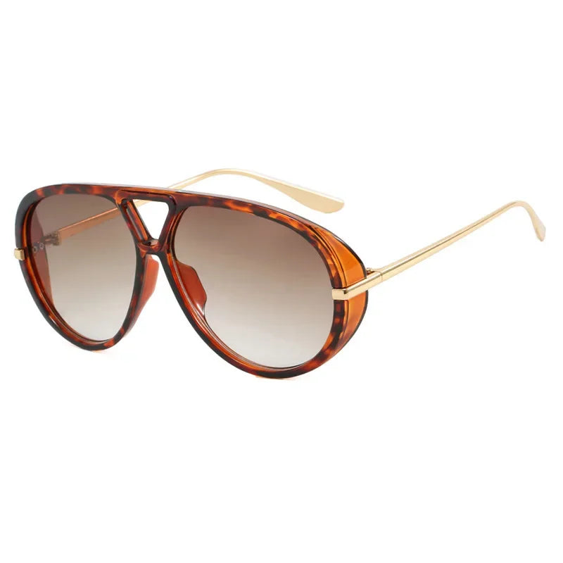 Brown tortoiseshell aviator style sunglasses with gold-toned arms